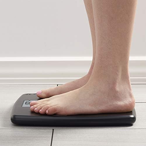 Black digital scale with body composition metrics — photo 3