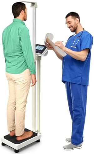 White medical scale with height rod
